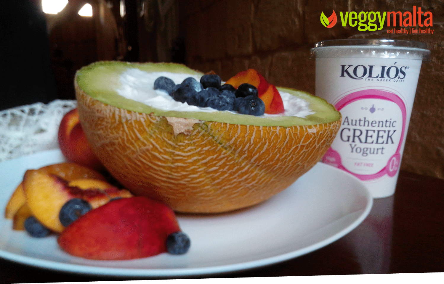 Blueberries and Kolios greek yogurt mix in fresh Cantaloupe bowl